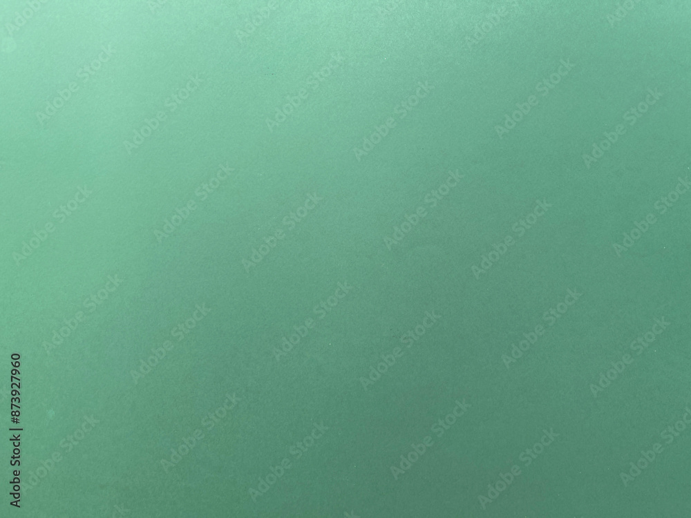 Background and texture. Background of a paper in green colour. Background and texture. Background of a paper in green colour.