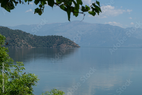 Bay views from green forests. View from the forest to the sea. Magnificent views from the forest to the sea. Magnificent bays of Muğla.