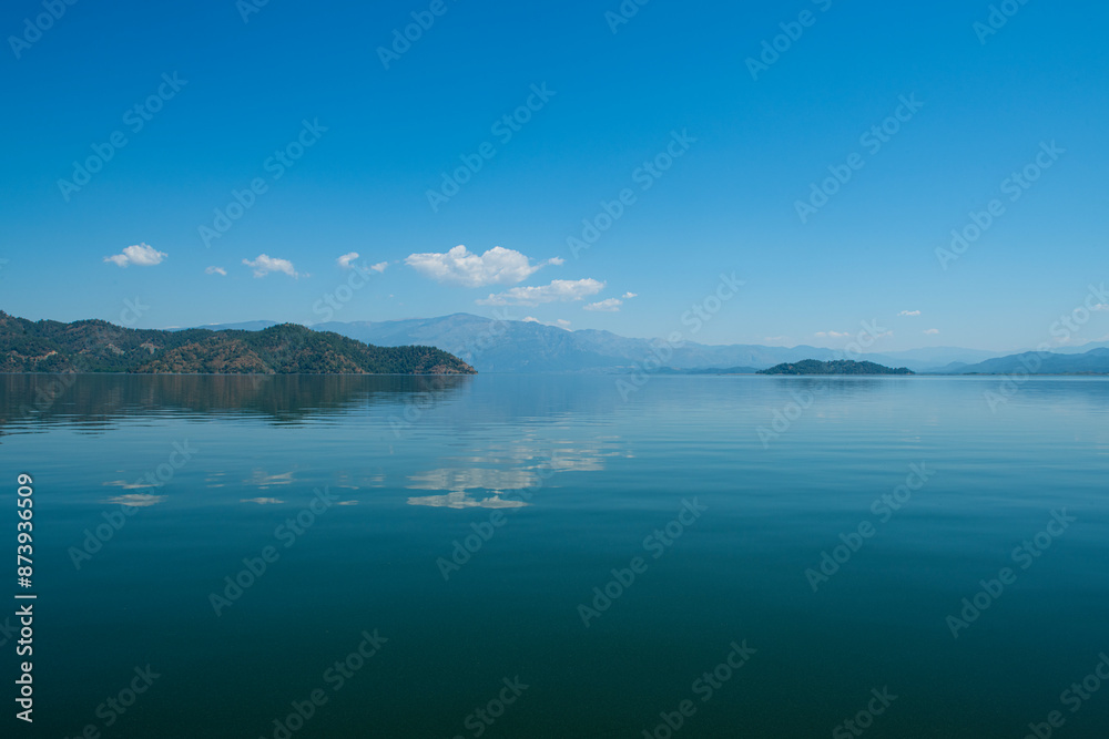 reflection of the forest in the lake.Bay views from green forests. View from the forest to the sea. Magnificent views from the forest to the sea. Magnificent bays of Muğla. reflection of the forest in the lake.Bay views from green forests. View from the forest to the sea. Magnificent views from the forest to the sea. Magnificent bays of Muğla.
