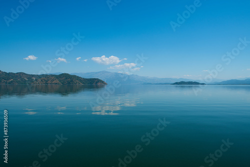 reflection of the forest in the lake.Bay views from green forests. View from the forest to the sea. Magnificent views from the forest to the sea. Magnificent bays of Muğla.
