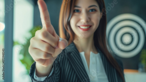 businesswoman pointing fing...