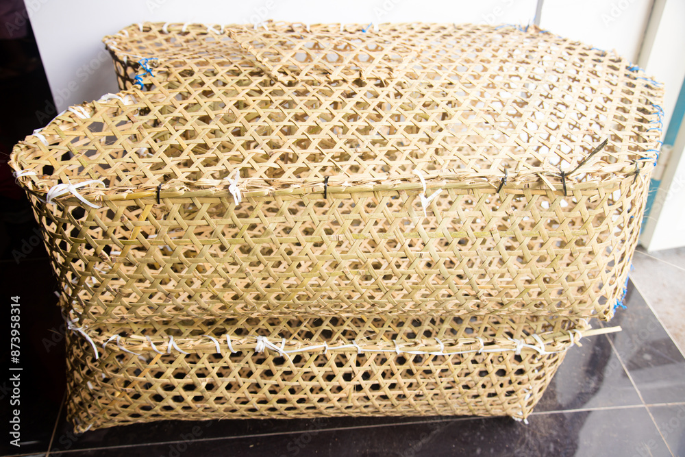 Bamboo traps are used to catch fish and shrimp at the bottom of rivers ...