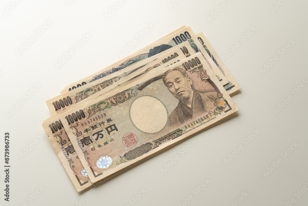 Japanese Yen banknote on white background Japanese Yen banknote on white background
