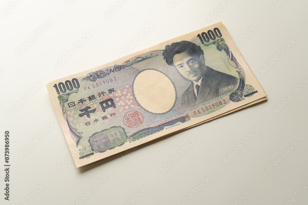 Japanese Yen banknote on white background Japanese Yen banknote on white background