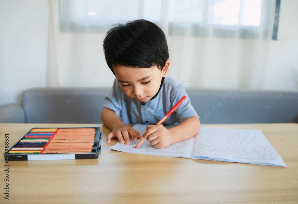 Little boy drawing and coloring Inside the living room happily Ideas to enhance learning and build imagination Little boy drawing and coloring Inside the living room happily Ideas to enhance learning and build imagination