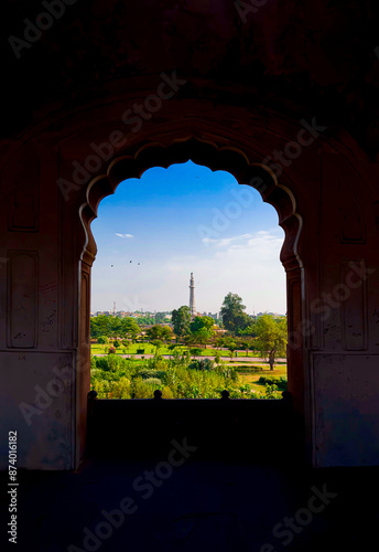 minar e pakistan photography from arch to show brightness and greenery around it. photo