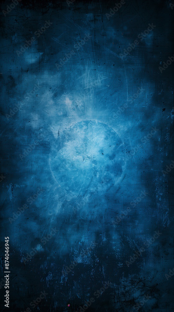 Naklejka premium Abstract blue background with bright center spotlight and dark vignette border frame with vintage grunge background texture.