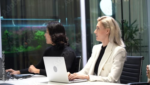 Wallpaper Mural businesswoman manager raises hand to ask question to diversity group of business team in meeting at board room. Presents in office conference Torontodigital.ca