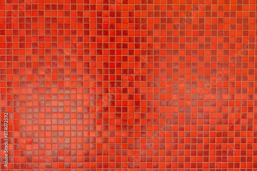 Fotografía A red tile wall with a red background