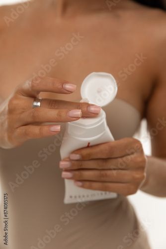 woman applying cream