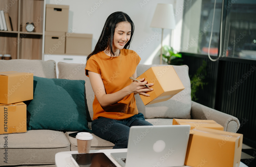 Small business entrepreneur SME freelance woman working at home office, BOX,tablet and laptop online, marketing, packaging, delivery Small business entrepreneur SME freelance woman working at home office, BOX,tablet and laptop online, marketing, packaging, delivery