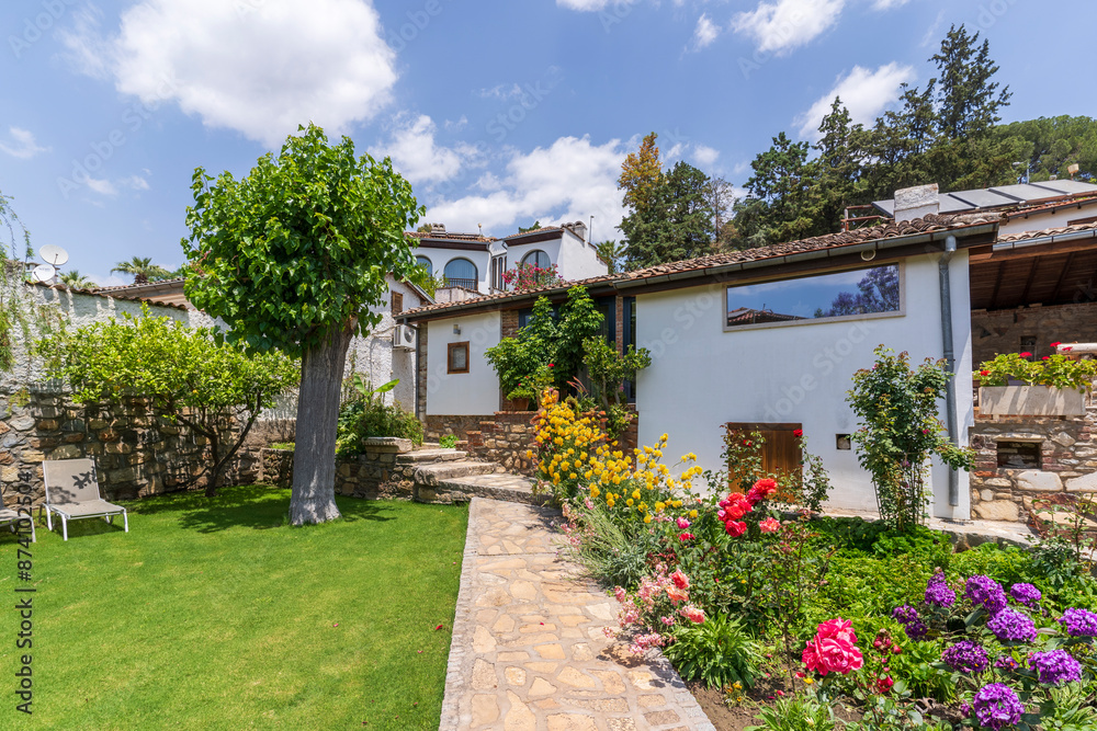 Fototapeta premium Traditional Aegean house garden view in Turkey