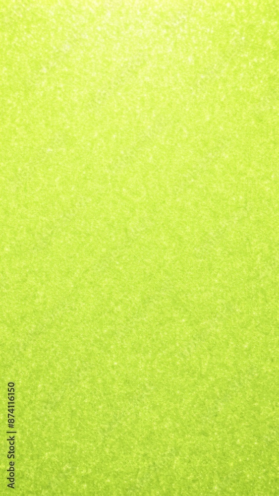 Fototapeta premium The image displays a uniform lime green textured background. 