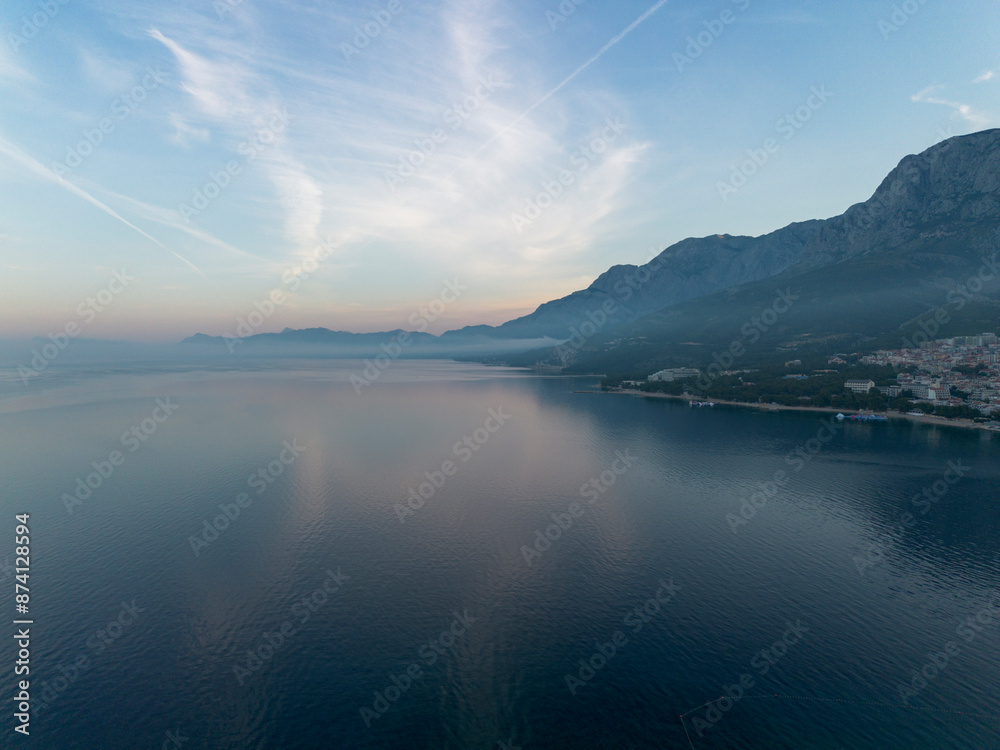 Fototapeta premium Aerial landscape. Morning foggy sunrise on the Adriatic coast in Croatia, Makarska