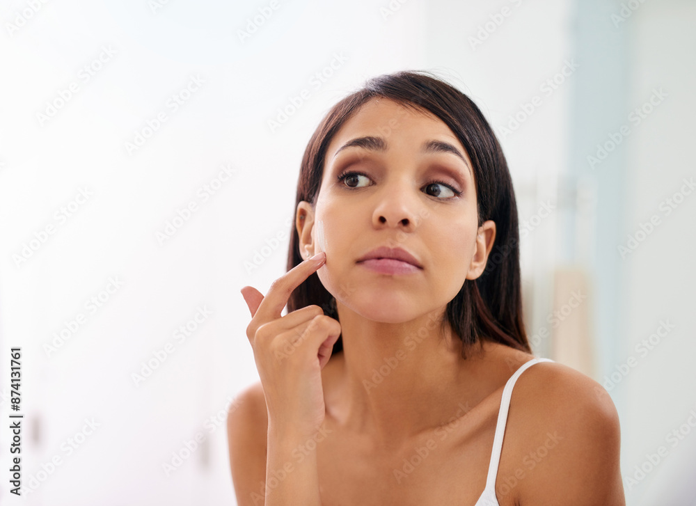 Woman, mirror and cream for cosmetics in home, moisturizer and hydration ointment in bathroom. Female person, clean and clear skin by dermatology or lotion, beauty and spf treatment in reflection Woman, mirror and cream for cosmetics in home, moisturizer and hydration ointment in bathroom. Female person, clean and clear skin by dermatology or lotion, beauty and spf treatment in reflection
