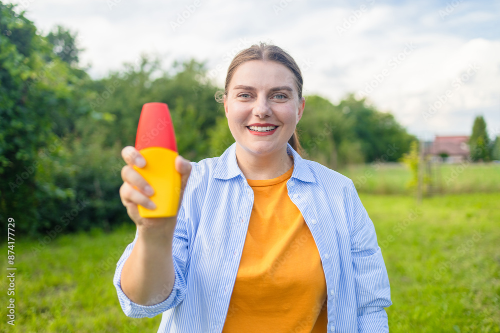 Mosquito repellent. Woman using insect repellent spray outdoors. High quality photo Mosquito repellent. Woman using insect repellent spray outdoors. High quality photo
