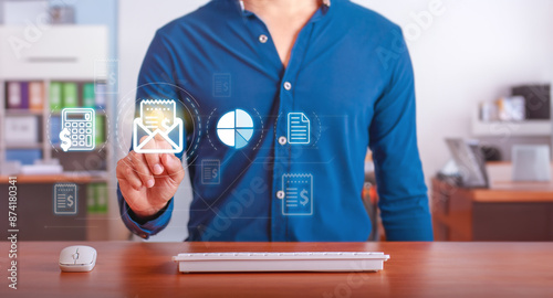 Invoicing and Financial Management. Businessman using digital tools for invoice processing and financial analysis in a modern office