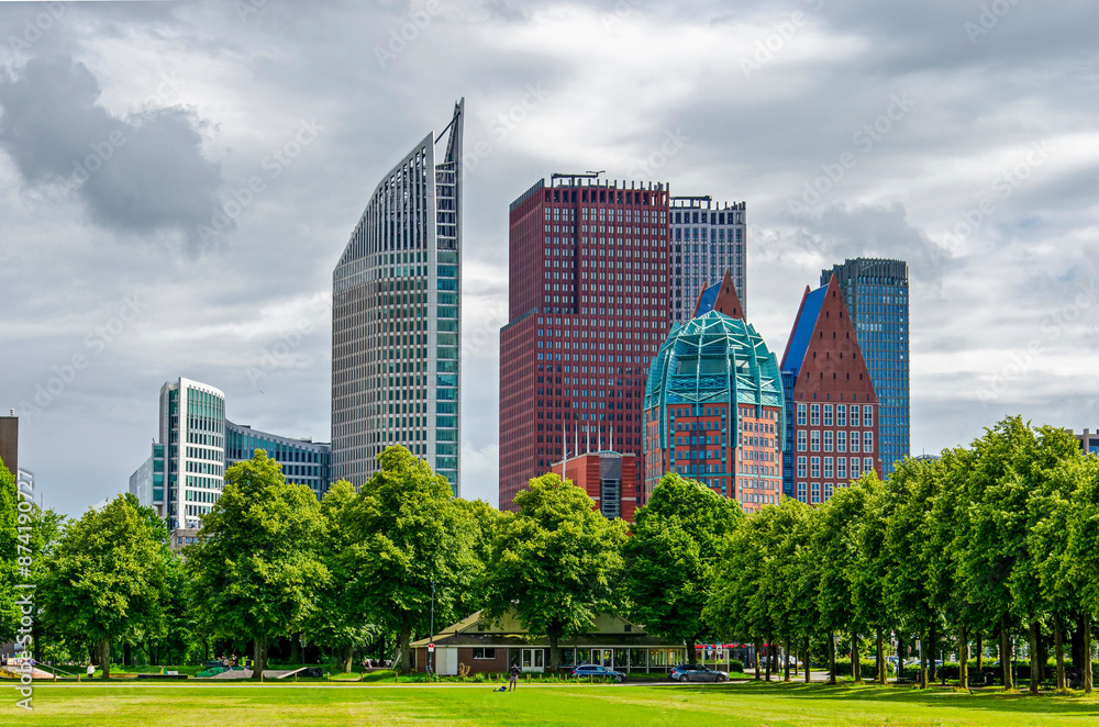 The Hague, The Netherlands, June 16, 2024: several modern skyscrapers with in the foreground Malieveld park, often used for rallies and concerts The Hague, The Netherlands, June 16, 2024: several modern skyscrapers with in the foreground Malieveld park, often used for rallies and concerts