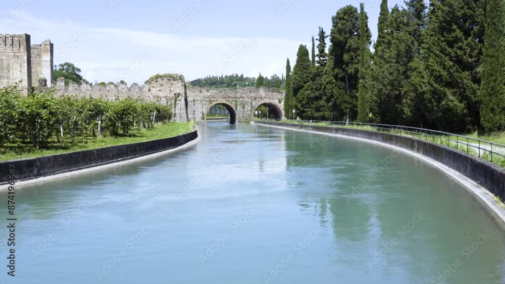 the Visconteo Bridge in Borghetto sul Mincio Visconteo is a fortified dam that was built in 1393 and completed in 1395 at the behest of the Duke of Milan Gian Galeazzo Visconti. the Visconteo Bridge in Borghetto sul Mincio Visconteo is a fortified dam that was built in 1393 and completed in 1395 at the behest of the Duke of Milan Gian Galeazzo Visconti.
