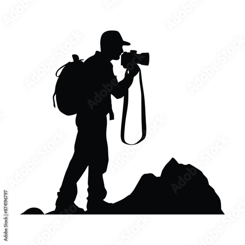 A photographer who shoots a photograph of the mountains on a white background