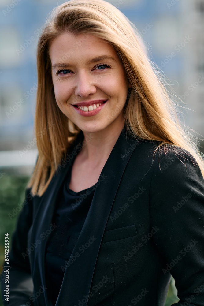 Portrait of a Stylish Business Blonde Posing on Terrace in Urban Cityscape. Portrait of a Stylish Business Blonde Posing on Terrace in Urban Cityscape.
