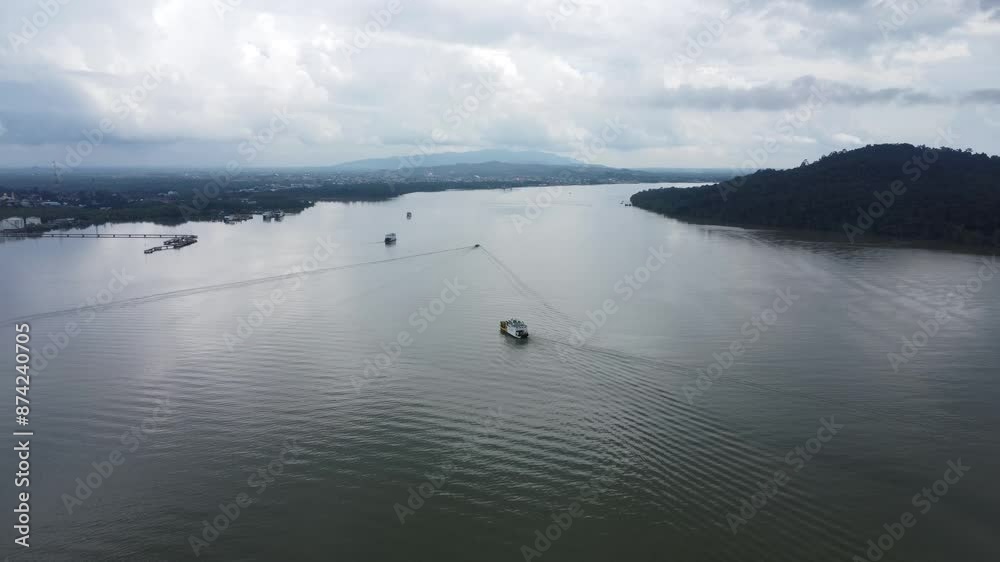 Ferries carry passengers sailing on the Kalimantan sea Ferries carry passengers sailing on the Kalimantan sea