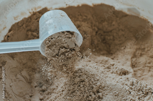 Protein powder and protein drinks with scoops. Nutritional supplement for athletes