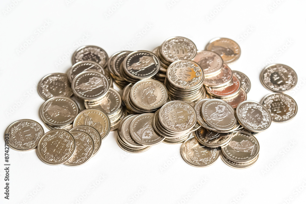coins spread on white background