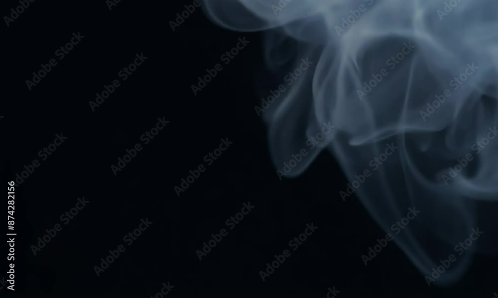 A black background withdefocused smoke. The line is thin and it is in the middle of the background
