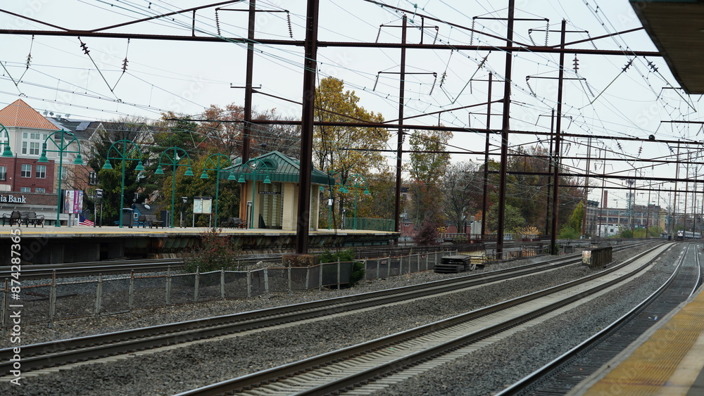The train station view with the iron tracks near the platform The train station view with the iron tracks near the platform