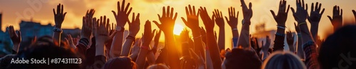 Crowd Silhouettes Raised Hands During Sunset