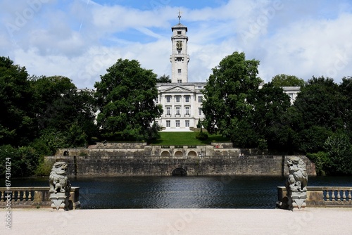 Looking across Highfields Lake to Nottingham University. Trent Building. Blue cloudy day