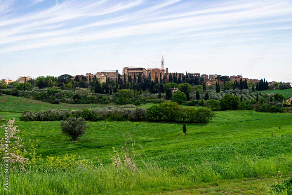 Tuscany, Italy-April 22, 2024: Historic Hilltop Town Surrounded by Greenery Tuscany, Italy-April 22, 2024: Historic Hilltop Town Surrounded by Greenery