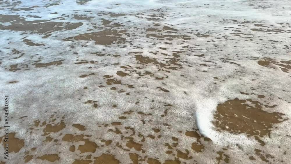 Aerial view beach sand background for summer vacation concept. Beach nature and summer seawater with sunlight light sandy beach Sparkling . High quality 4k footage