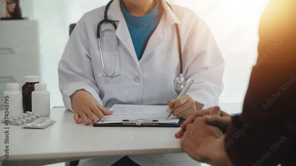 Doctor prescribing medicine giving pills to senior grandmother patient at hospital. Doctor prescribing medicine giving pills to senior grandmother patient at hospital.