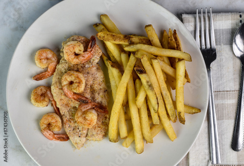 seasoned chicken breast top with shrimp