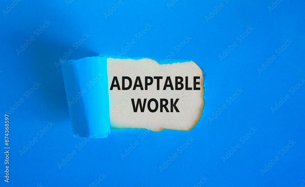 Adaptable work symbol. Concept words Adaptable work on beautiful white paper. Beautiful blue paper background. Business Adaptable work concept. Copy space. Adaptable work symbol. Concept words Adaptable work on beautiful white paper. Beautiful blue paper background. Business Adaptable work concept. Copy space.