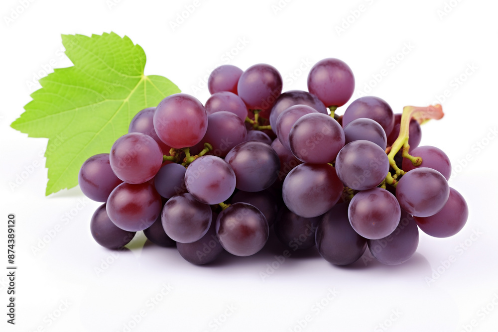 purple bunch of grapes one with green leaves isolated on white purple bunch of grapes one with green leaves isolated on white