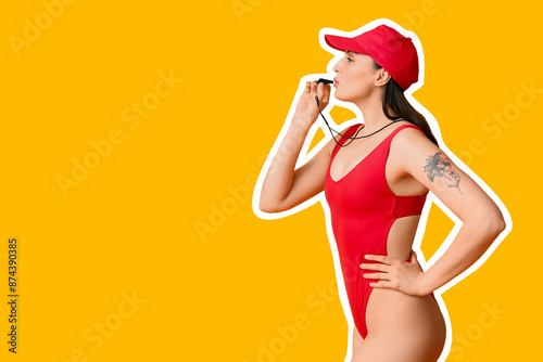 Female lifeguard blowing in...