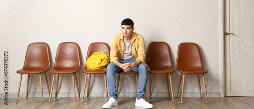 Young man waiting for his t...