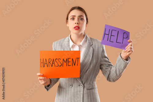 Young businesswoman holding...