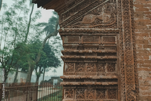 Beautiful details and bas reliefs of ancient Hindu Pancharatna Temple (Temple of the Five Jewels) in Puthia Bangladesh photo