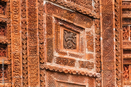 Beautiful details and bas reliefs of ancient Hindu Pancharatna Temple (Temple of the Five Jewels) in Puthia Bangladesh photo