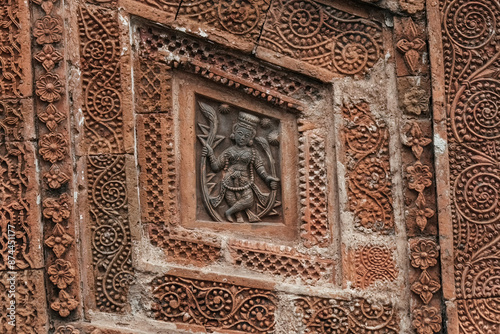 Beautiful details and bas reliefs of ancient Hindu Pancharatna Temple (Temple of the Five Jewels) in Puthia Bangladesh photo