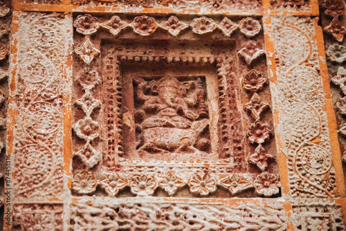 Beautiful details and bas reliefs of ancient Hindu Pancharatna Temple (Temple of the Five Jewels) in Puthia Bangladesh photo