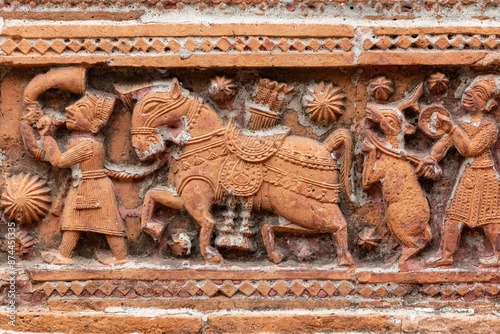 Beautiful details and bas reliefs of ancient Hindu Pancharatna Temple (Temple of the Five Jewels) in Puthia Bangladesh photo