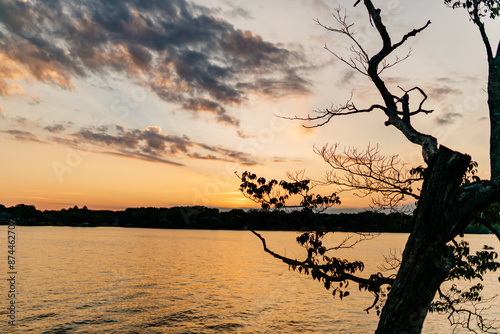 Beautiful sky and lake at sunset. Beautiful orange and blue sky at dawn. Lake Bowen Anchor Park, Inman, SC, USA  photo