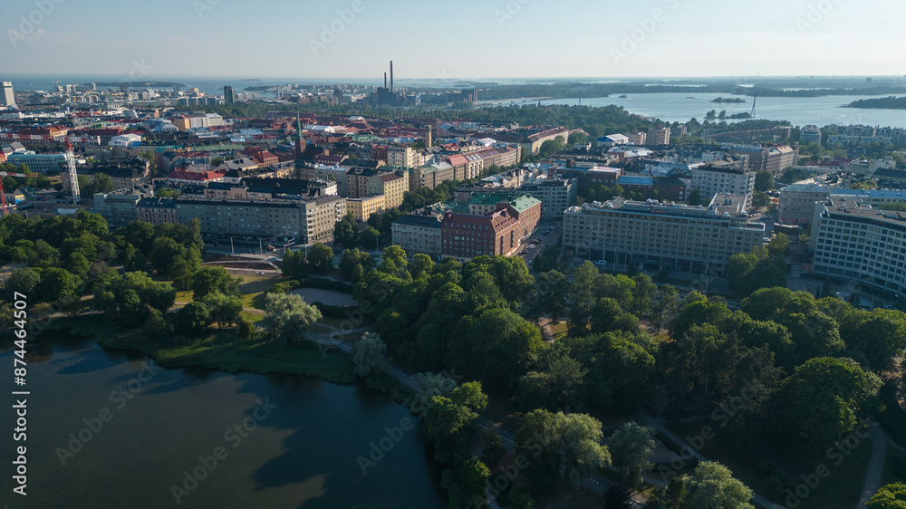 Fototapeta premium Helsinki city capital fo Finland. These drone photos capture the beautiful city of Helsinki from the sky, showcasing its stunning architecture, vibrant cityscape, and the harmonious blend of modernity