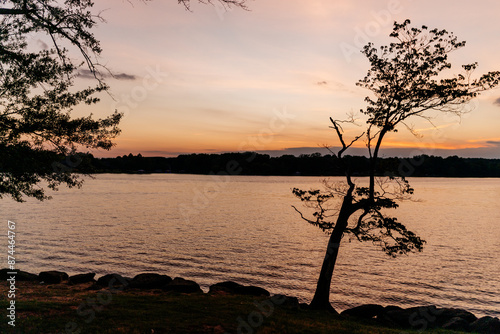 Beautiful sky and lake at sunset. Beautiful orange and blue sky at dawn. Lake Bowen Anchor Park, Inman, SC, USA  photo