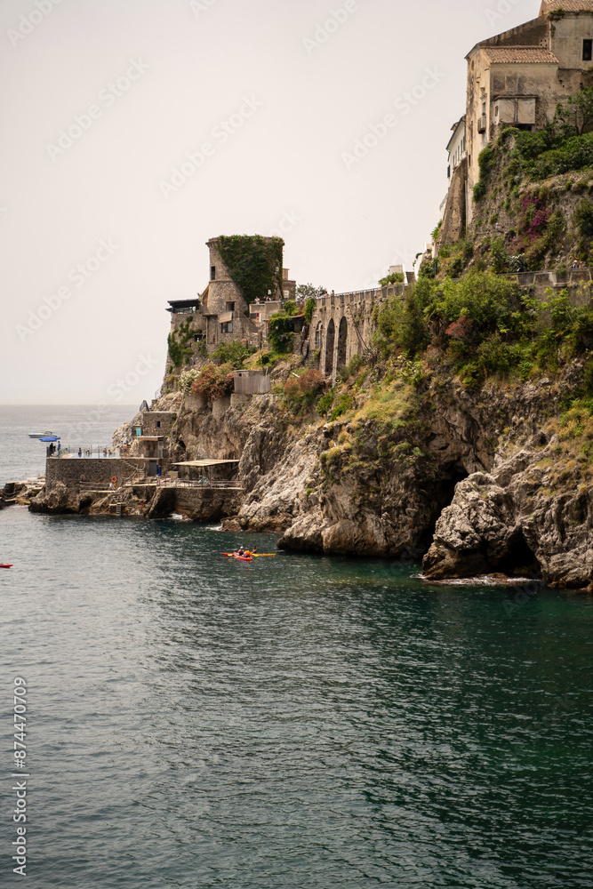 Scenic panoramic view of the beautiful town of Amalfi at famous Amalfi Coast with Gulf of Salerno in summer, Campania, Italy